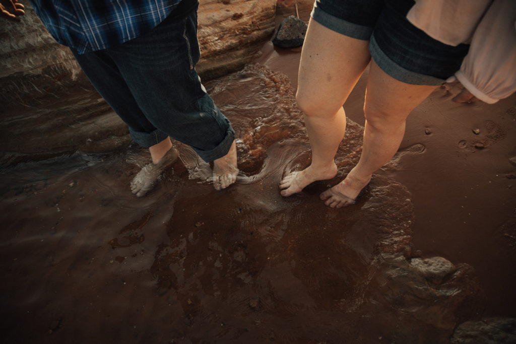 barefeet in the red sand